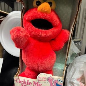 Sesame Street Elmo Plush in Bright Red with Orange Nose Accent